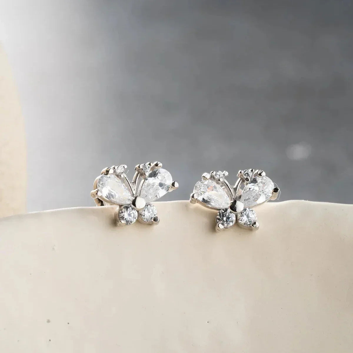 SCHMETTERLING BAGUETTE STEIN OHRRINGE | 925 SILBER